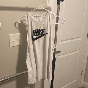 Two small, and xs nike tanks.
